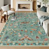Covaba modern parisian insect area rug in sage mist, styled in a room setting, view 3