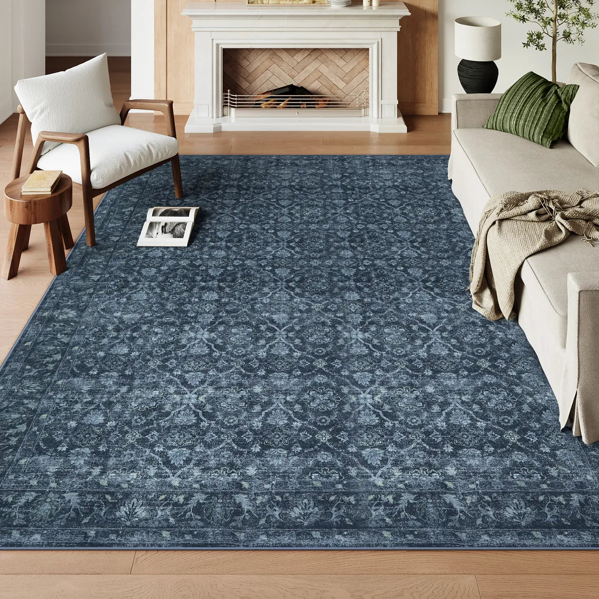 Covaba vintage persian distressed area rug in stormy blue, styled in a room setting