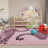 Covaba modern safari leopard area rug in blush clay, styled in a room setting, view 6