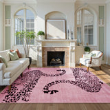 Covaba modern safari leopard area rug in blush clay, styled in a room setting