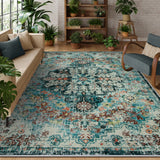 Covaba bohemian floral medallion area rug in teal haze, styled in a room setting, view 2
