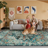 Covaba bohemian floral medallion area rug in teal haze, styled in a room setting, view 4