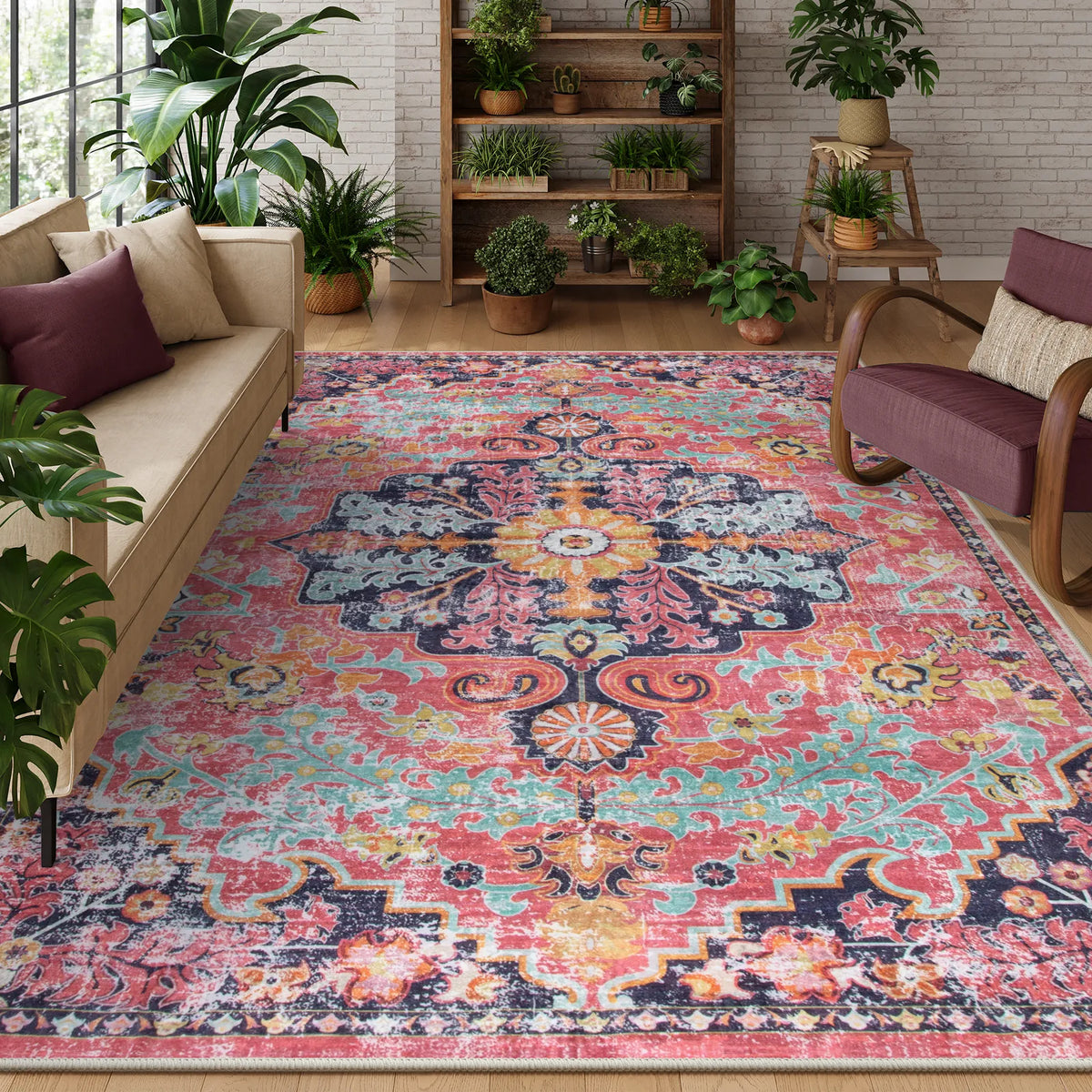 Covaba bohemian floral medallion area rug in faded rose, styled in a room setting