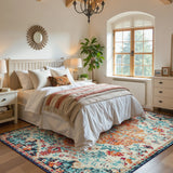 Covaba bohemian floral medallion area rug in amber clay, styled in a room setting, view 9