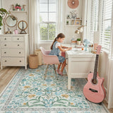 Covaba boho modern parisian garden floral area rug in stormy blue, styled in a room setting, view 2