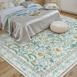 Covaba boho modern parisian garden floral area rug in stormy blue, styled in a room setting, view 4