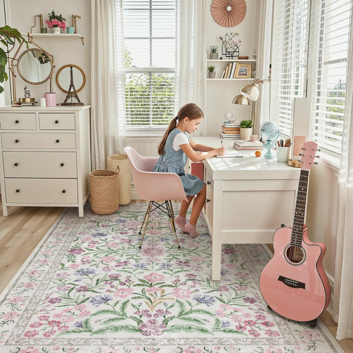 Covaba boho modern parisian garden floral area rug in muted plum, styled in a room setting