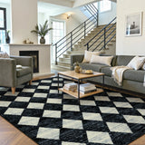 Covaba modern geometric diamond checkered area rug in ink black, styled in a room setting, view 2