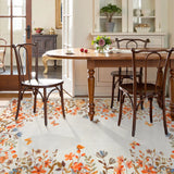 Covaba modern blooming floral garden area rug in golden wheat, styled in a room setting, view 8