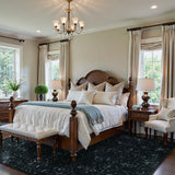 Covaba vintage persian distressed area rug in ink black, styled in a room setting, view 5