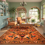 Covaba boho birdsong floral garden area rug in amber clay, styled in a room setting, view 9