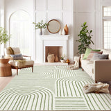 Covaba abstract rainbow stripe green/white area rug in fern green, styled in a room setting, view 7