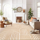 Covaba abstract rainbow stripe orange/white area rug in amber clay, styled in a room setting, view 2