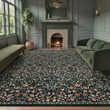 Covaba maximalism vibrant blossom floral area rug in ink black, styled in a room setting, view 9