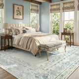 Covaba vintage traditional floral area rug in stormy blue, styled in a room setting, view 7