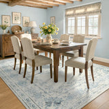 Covaba vintage traditional floral area rug in stormy blue, styled in a room setting, view 8
