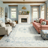 Covaba vintage traditional floral area rug in stormy blue, styled in a room setting, view 6