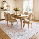 Covaba vintage traditional floral area rug in blush clay, styled in a room setting, view 16