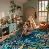 Covaba jungle midnight area rug in stormy blue, styled in a room setting, view 11