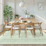 Covaba modern minimalist line area rug in fern green, styled in a room setting, view 6