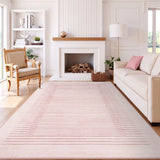 Covaba modern minimalist line area rug in blush clay, styled in a room setting, view 7