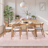 Covaba modern minimalist line area rug in blush clay, styled in a room setting, view 8