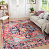 Covaba bohemian floral medallion area rug in faded rose, styled in a room setting, view 12
