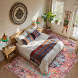 Covaba bohemian floral medallion area rug in faded rose, styled in a room setting, view 15