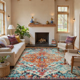 Covaba bohemian floral medallion area rug in amber clay, styled in a room setting, view 11