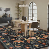 Covaba boho birdsong floral garden area rug in ink black, styled in a room setting, view 13