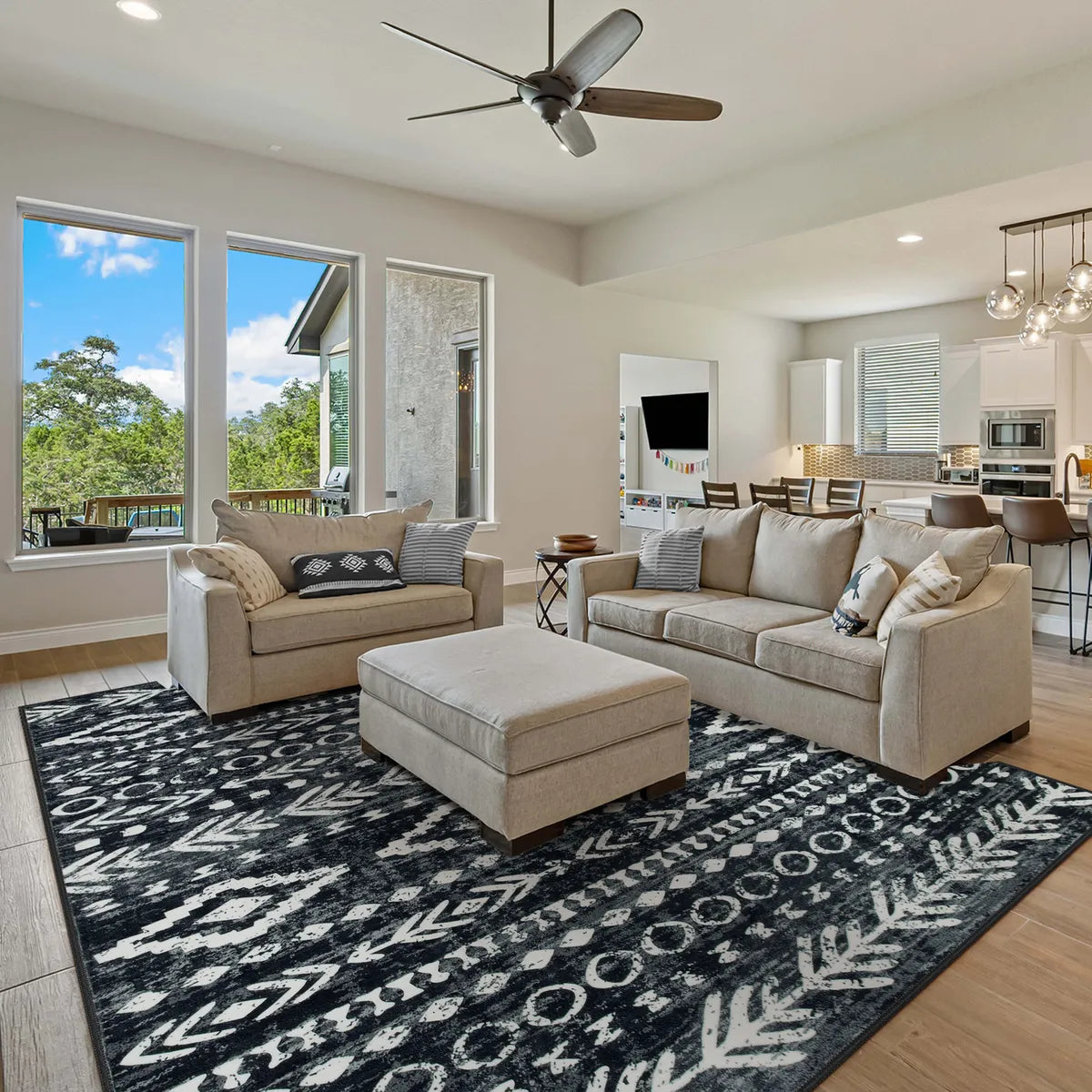Covaba modern rustic farmhouse moroccan tribal black/white area rug in soft white, styled in a room setting