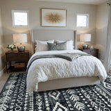 Covaba modern rustic farmhouse moroccan tribal black/white area rug in soft white, styled in a room setting, view 6