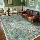 Covaba modern parisian insect area rug in sage mist, styled in a room setting, view 8