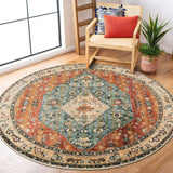Covaba boho vintage tribal round rug in burnt rust, styled in a room setting, view 6