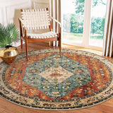 Covaba boho vintage tribal round rug in burnt rust, styled in a room setting, view 8