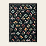 Covaba meadow floral area rug in ink black, shown flat on a plain ivory backdrop