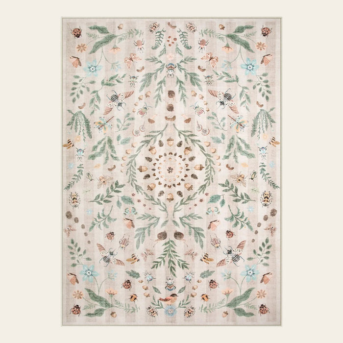 Covaba boho insect botanical floral area rug in warm beige, shown flat on a plain ivory backdrop