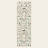 Covaba boho insect botanical floral runner rug in warm beige, shown flat on a plain ivory backdrop