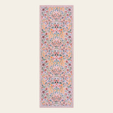 Covaba maximalism vibrant blossom floral runner rug in blush clay, shown flat on a plain ivory backdrop