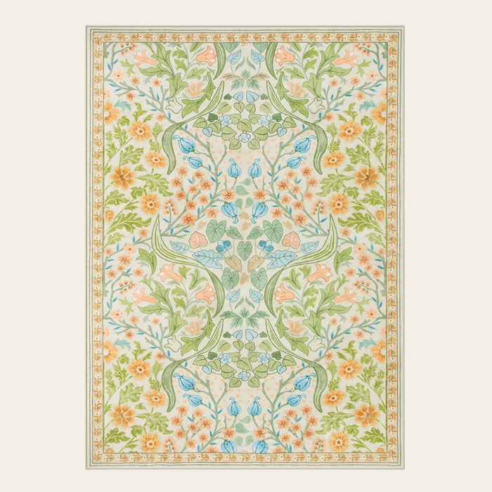 Covaba maximalism vibrant floral area rug in sage mist, shown flat on a plain ivory backdrop