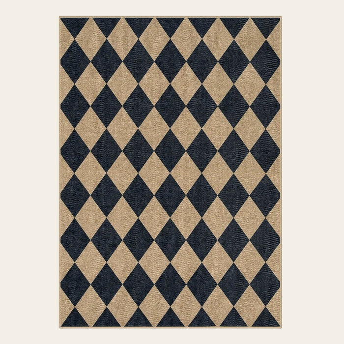 Covaba geometric checkered easy jute indoor/outdoor area rug in ink black, shown flat on a plain ivory backdrop