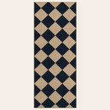 Covaba geometric checkered easy jute indoor/outdoor runner rug in ink black, shown flat on a plain ivory backdrop