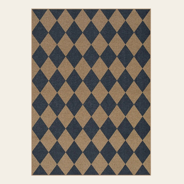 Covaba geometric checkered easy jute indoor/outdoor area rug in stormy blue, shown flat on a plain ivory backdrop