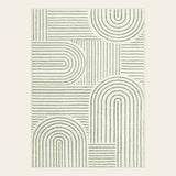 Covaba abstract rainbow stripe green/white area rug in fern green, shown flat on a plain ivory backdrop