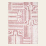 Covaba abstract rainbow stripe pink/white area rug in blush clay, shown flat on a plain ivory backdrop