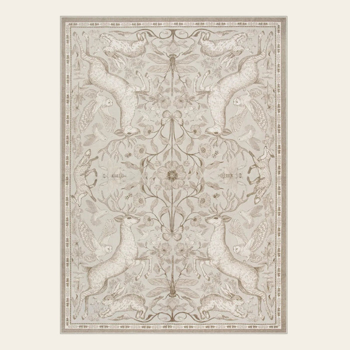 Covaba vintage woodland area rug in warm beige, shown flat on a plain ivory backdrop