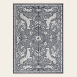 Covaba vintage woodland area rug in charcoal, shown flat on a plain ivory backdrop