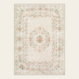 Covaba vintage traditional floral area rug in warm beige, shown flat on a plain ivory backdrop