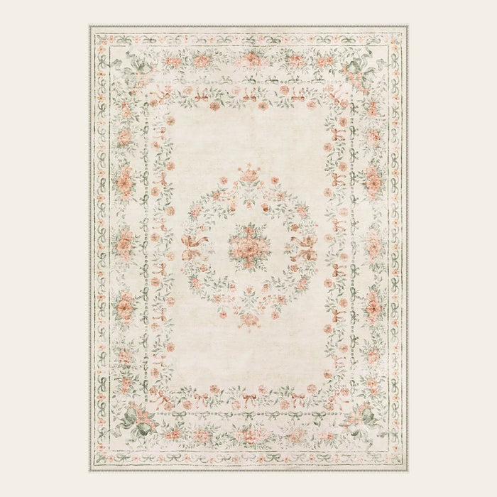 Covaba vintage traditional floral area rug in warm beige, shown flat on a plain ivory backdrop