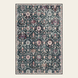 Covaba ultra-thin vintage floral moroccan trellis area rug in ink black, shown flat on a plain ivory backdrop
